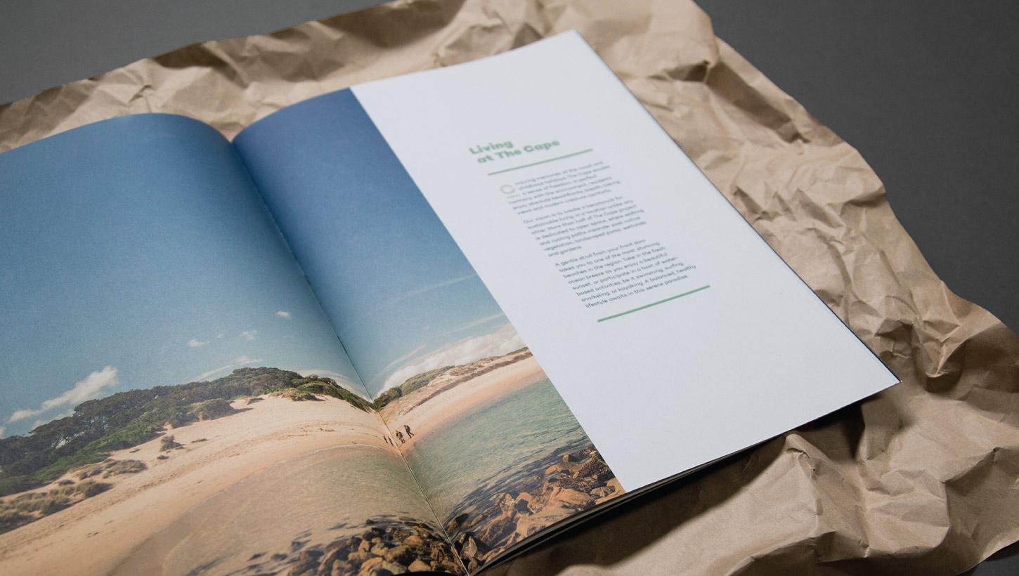 The Cape brochure spread on brown paper